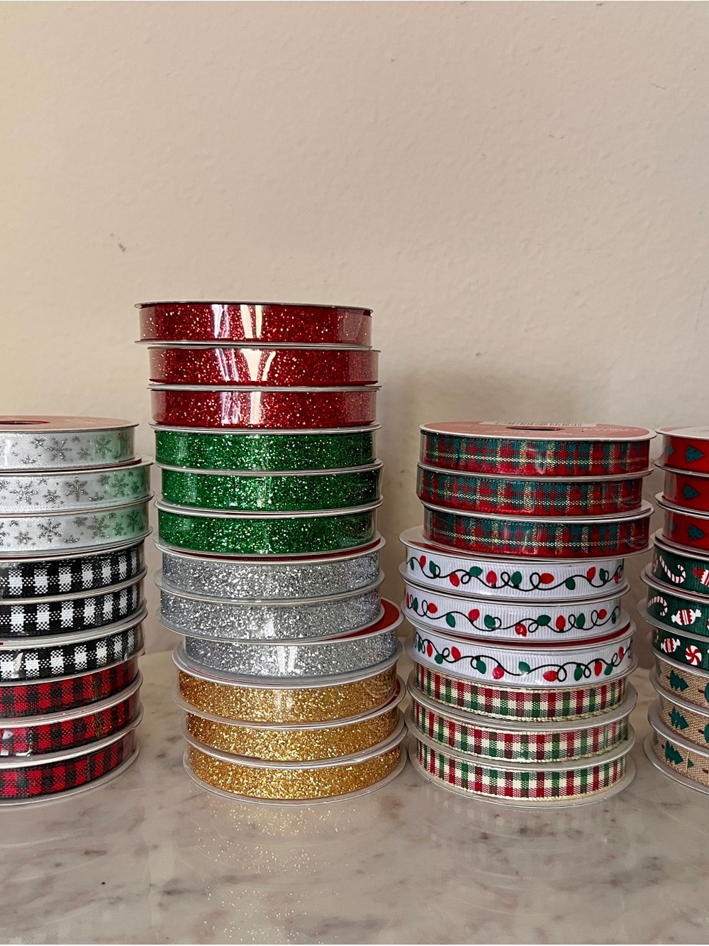 39 rolls of Celebrate it Christmas ribbons